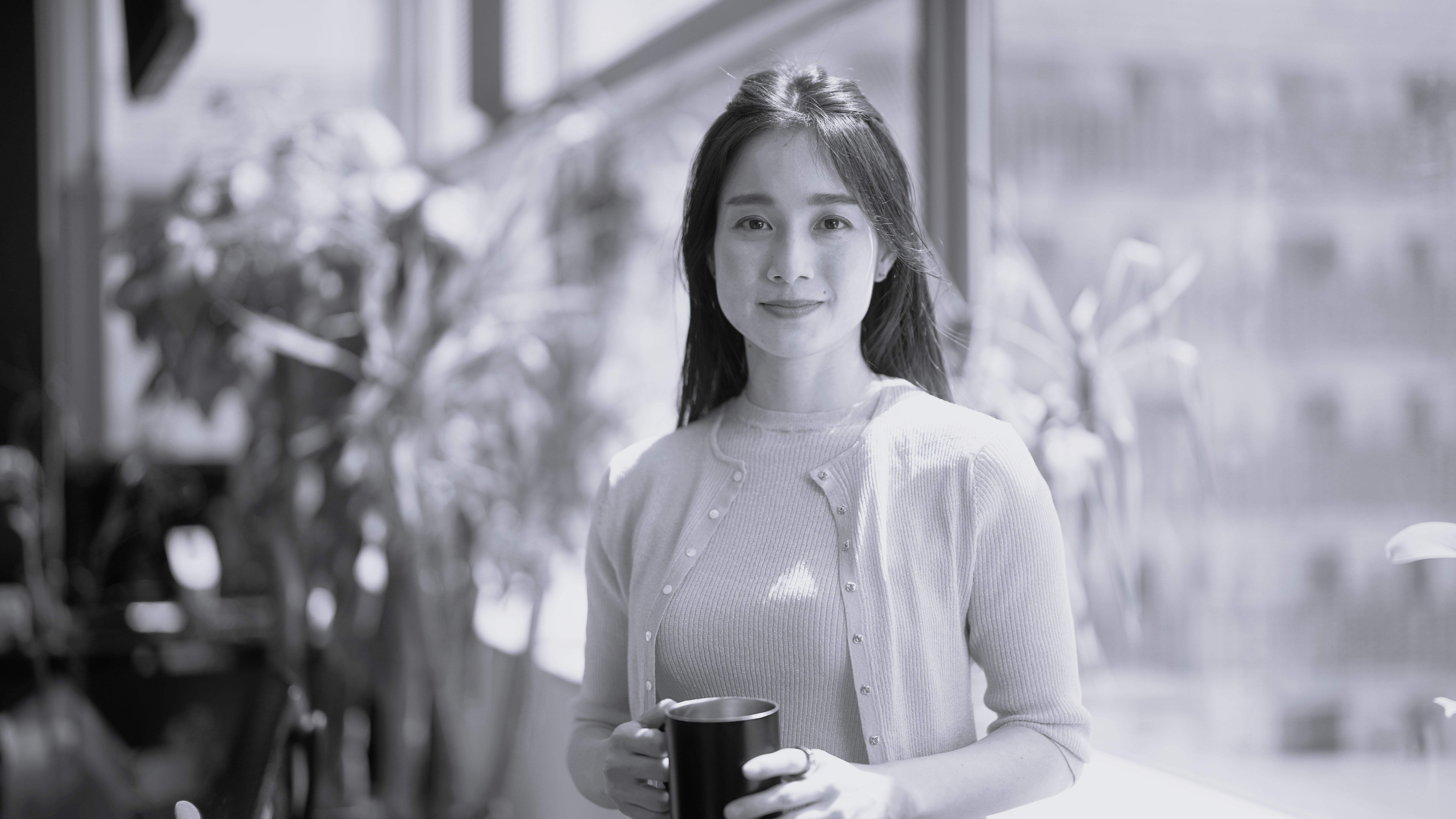 Portrait of businesswoman in modern green office